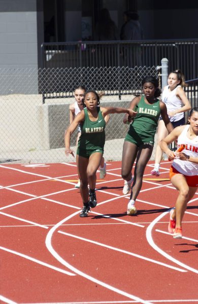 LT Girls Track Races in a Relay.
Credits: Mia Roberson